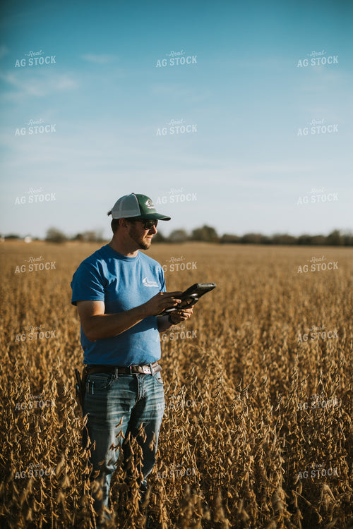 Farmer in Field with Tablet 7167