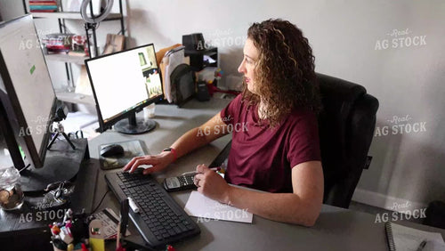 Female Farmer Working on Computer 8704