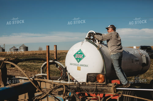 Farmer Hooking Up Anhydrous Ammonia Tank 3573