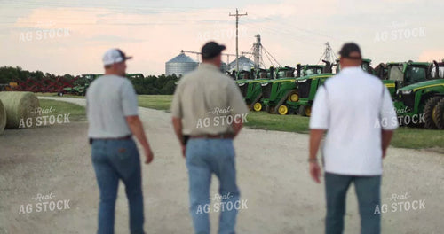 Farm Family Walking by Tractors 8673