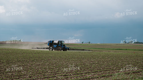 New Holland Self-Propelled Sprayer Applying Crop Protection to Early-Season Field 401015