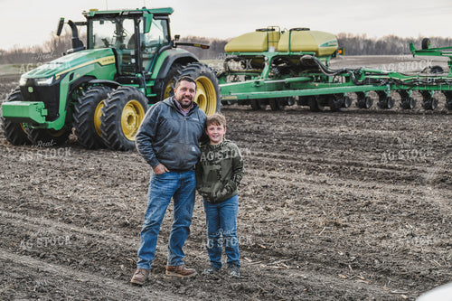Farmer and Son in Field with Planter 86016