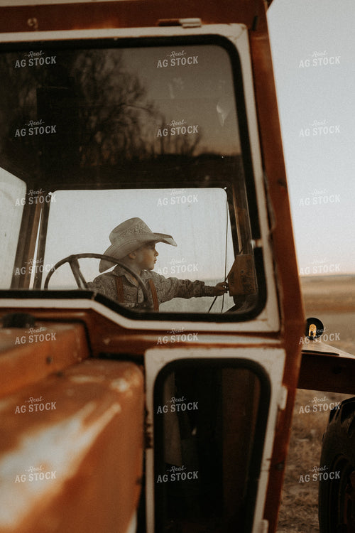 Farm Kid in Tractor Cab 61219
