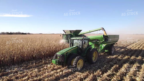 Aerial of Corn Harvest Combine Unloading 114034
