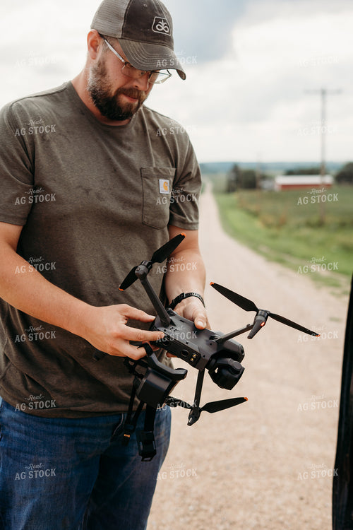 Farmer Holding Drone 196337
