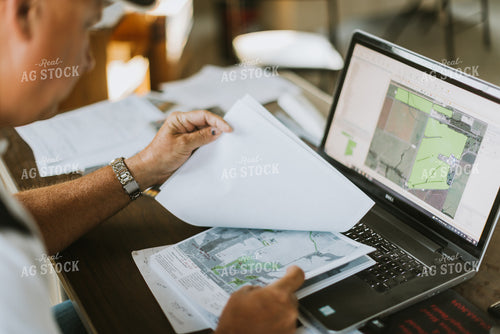 Farmer Working on Computer 7752