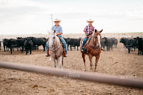 Ranch Kids on Horseback at Feedyard 218037