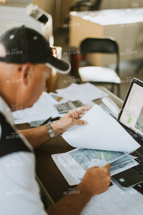 Farmer Working on Computer 7753