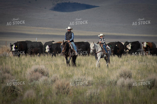 Rancher and Ranch Kid on Horseback 78192