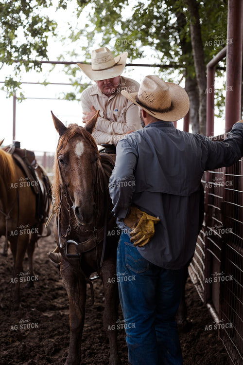 Ranchers Talking by Fence 205072