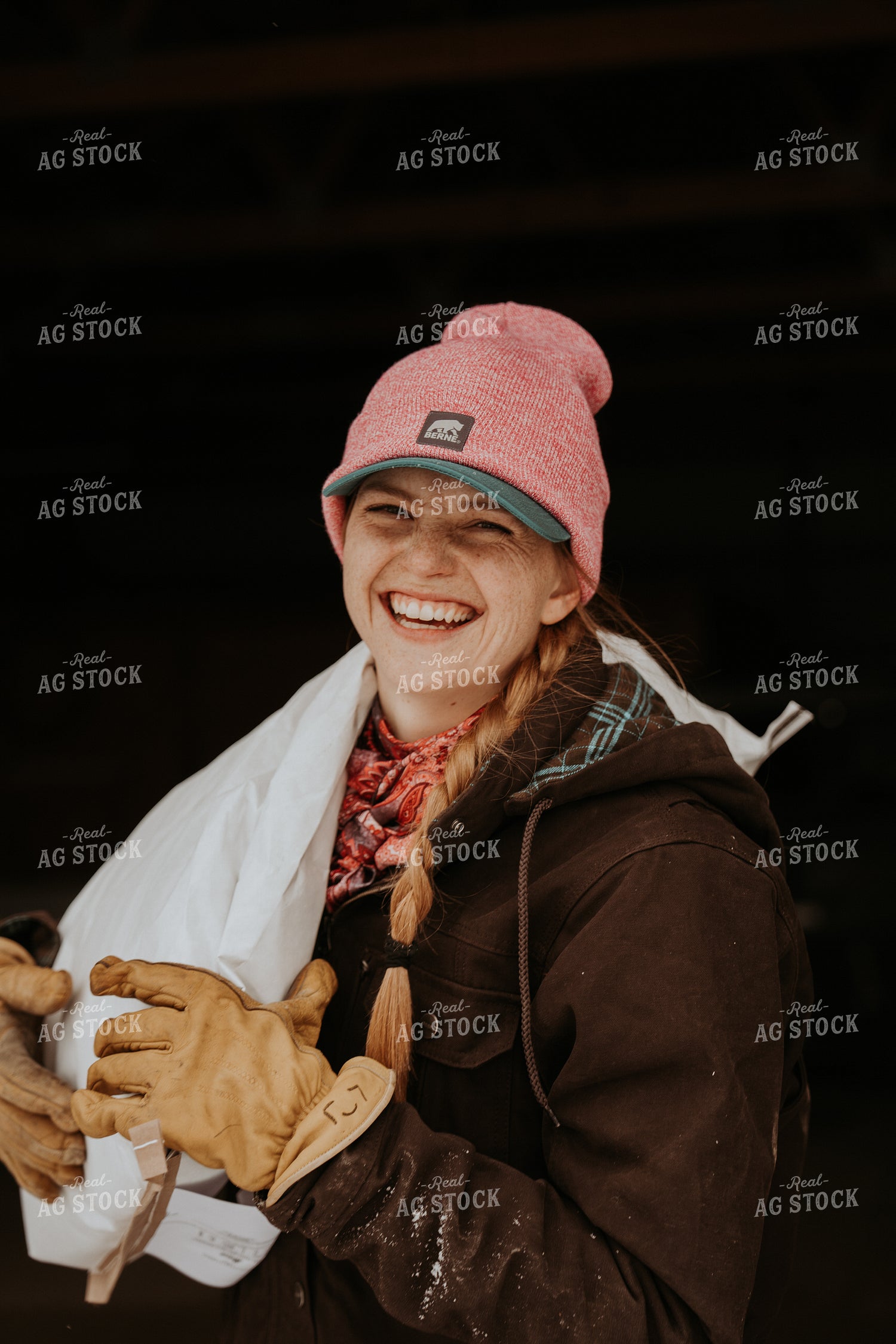 Female Rancher Carrying Feed Bag 61182