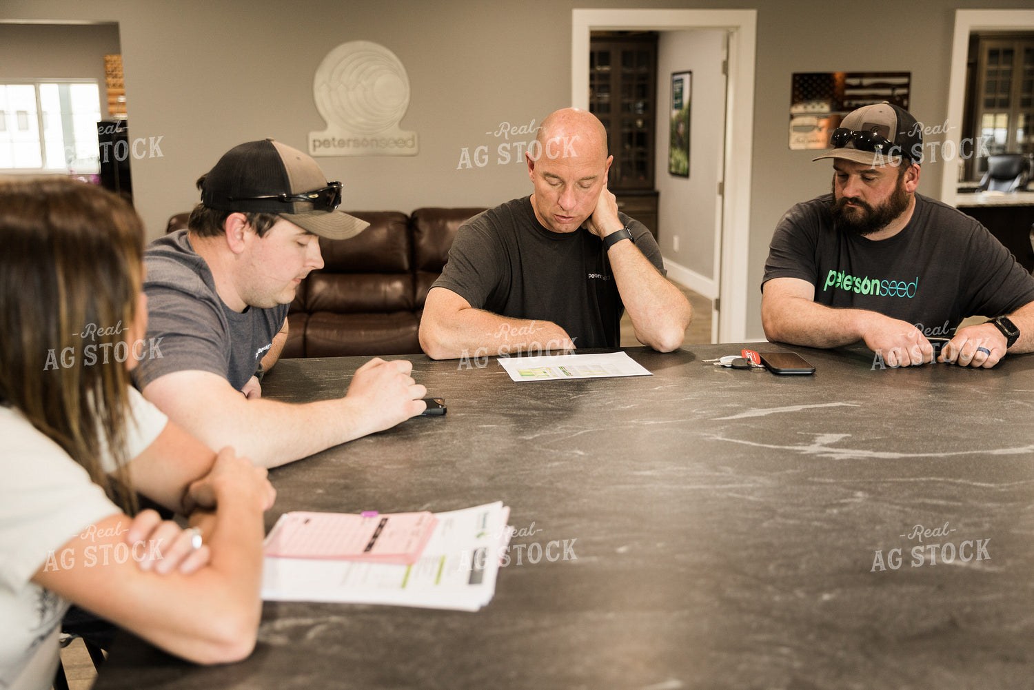 Farmers Review Seed Orders in Farm Office 7618