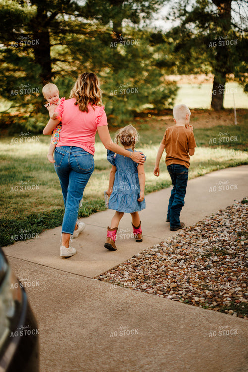 Farm Family Walking Inside 9360