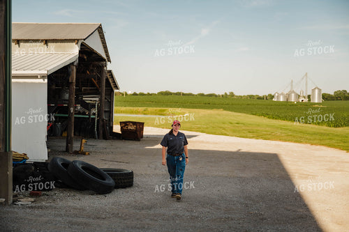 Female Farmer Walking on Farm 115244