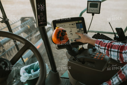 Female Farmer Driving Combine 3494