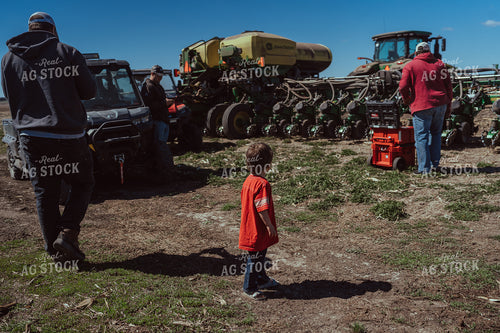 Farm Kid Helps with Test Plot 196093