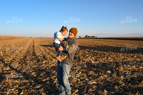 Farmer Holding Kid 26299