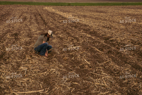 Female Farmer Checking Soil 67323