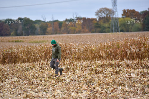 Farmer Walking in Field 84210