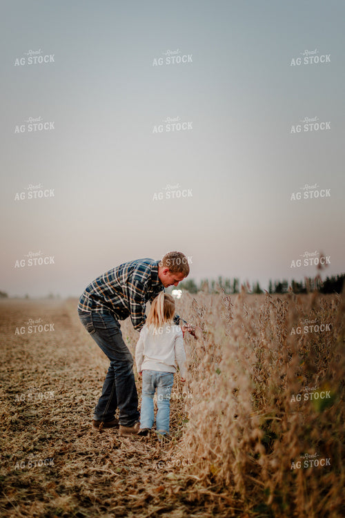 Farmer and Daughter Checking Soybeans 9279