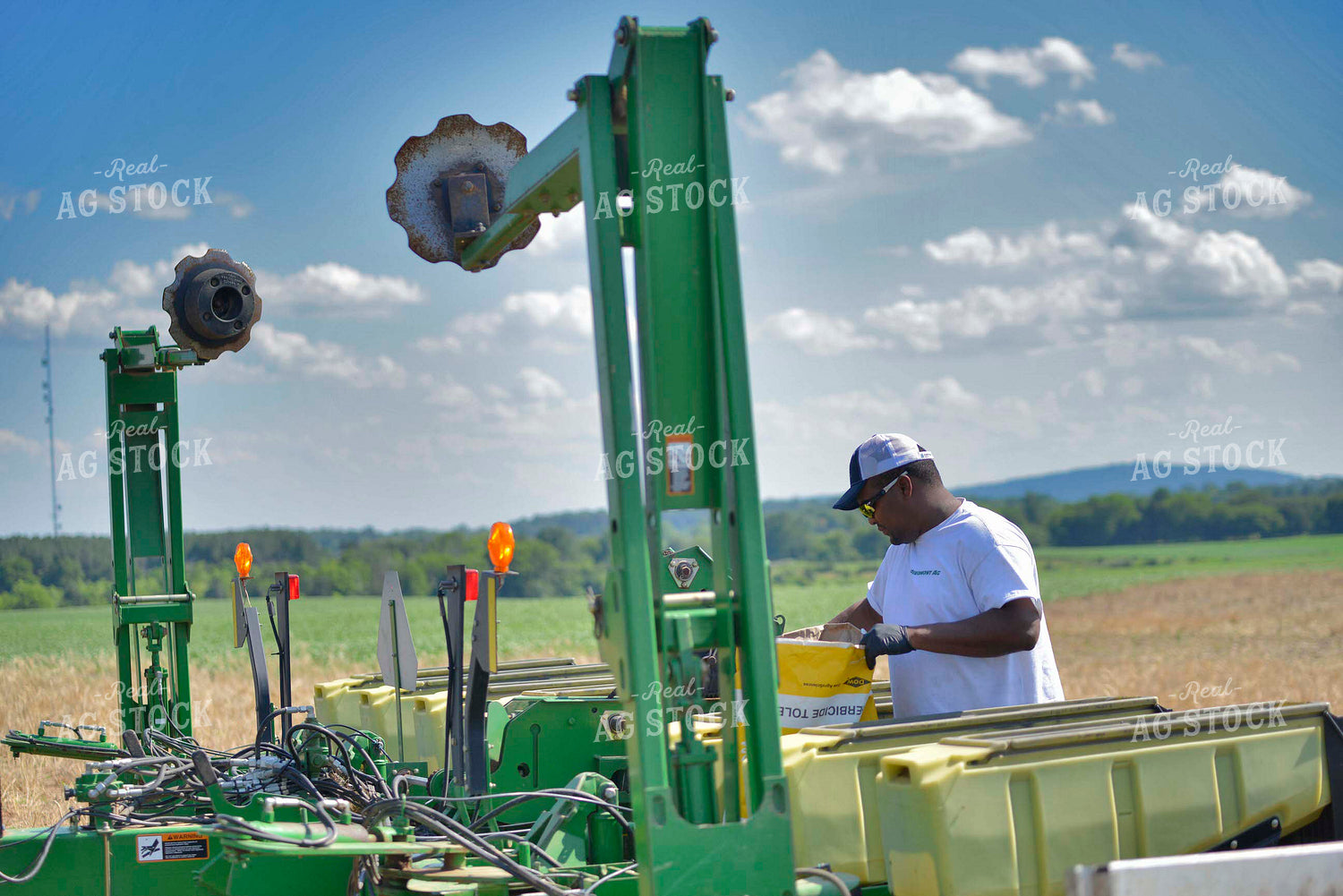 Farmer Filling Up Planter 110010