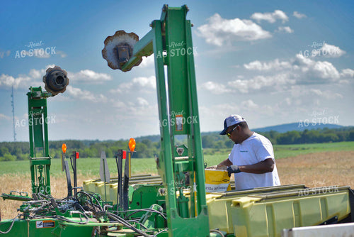 Farmer Filling Up Planter 110010
