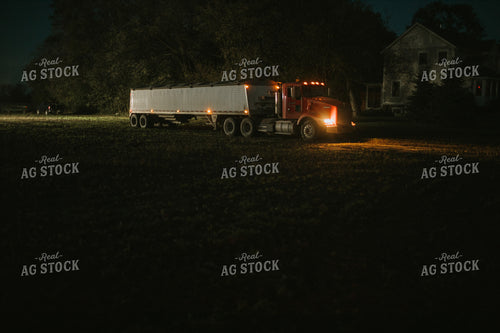 Semi Truck Pulling out of Soybean Field at Night 5155