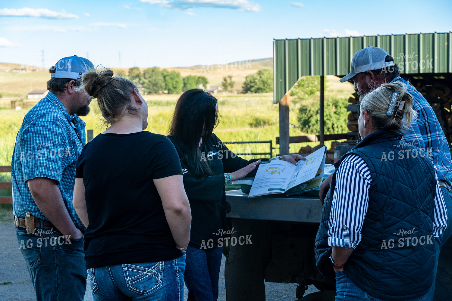 Sales Rep Talking With Ranchers 65891