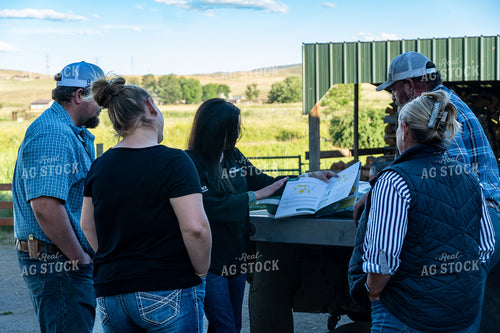 Sales Rep Talking With Ranchers 65891
