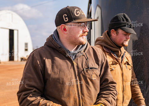 Ranchers Talking by Truck 231085