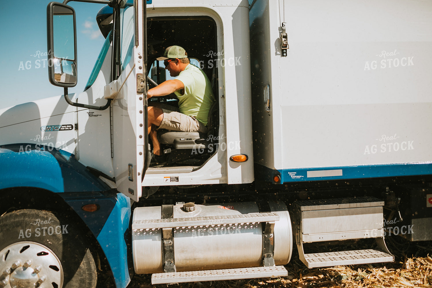 Farmer in Tandem Grain Truck 4698
