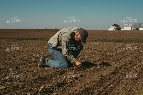 Farmer Checking Planting Depth 4004