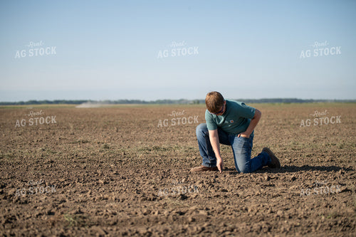 Farm Kid Checking Seed Depth 86037