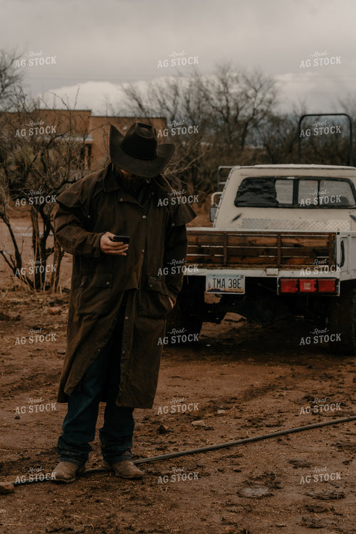 Rancher Using Phone 58277