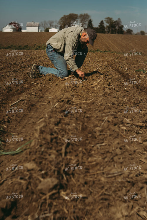 Farmer Checking Planting Depth 4007