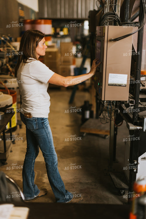 Woman Farmer Treats Seed 7583