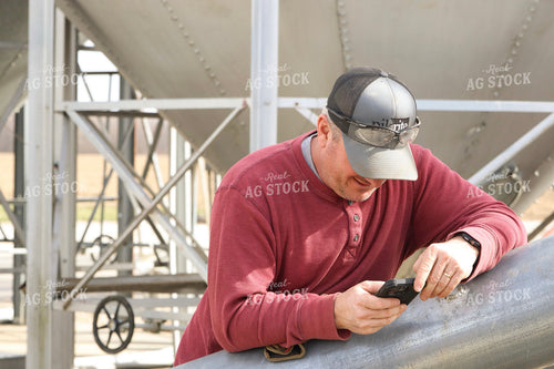 Farmer using Phone 109117