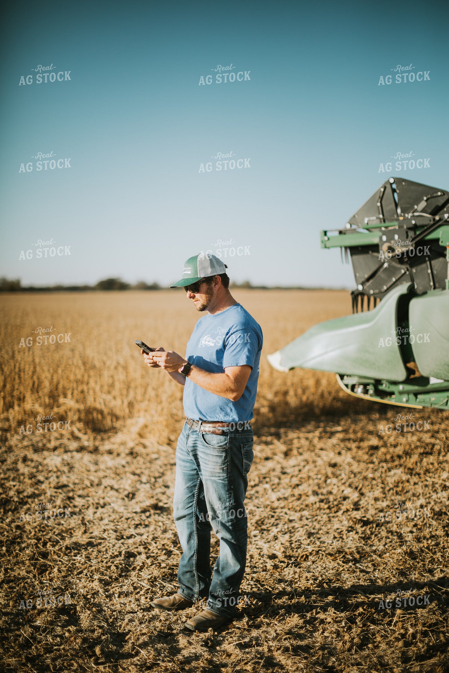 Farmer on Phone in Field 7135