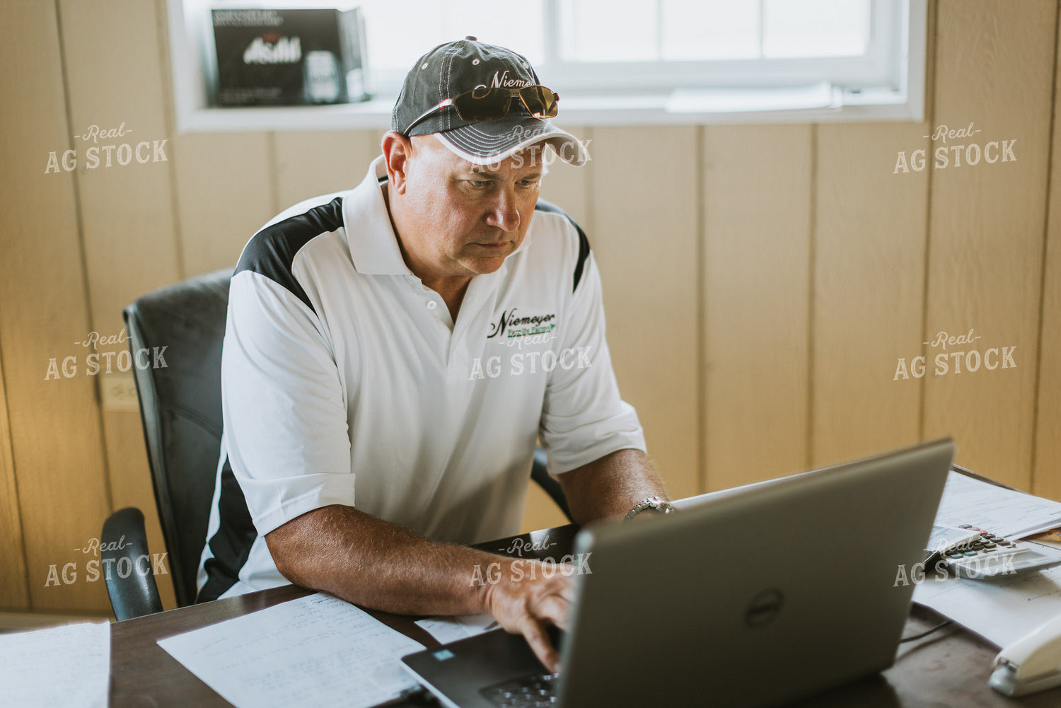 Farmer Working on Computer 7749