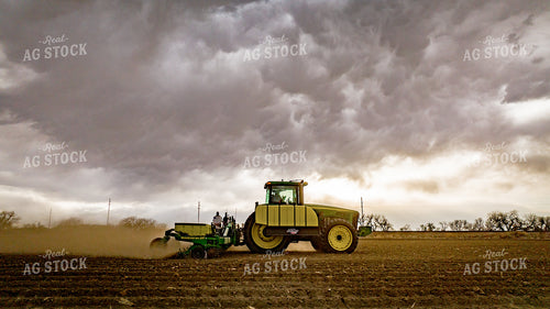 Tractor Plants Field Before Storm 56625