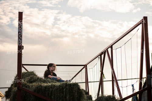 Farm Kid on Hay Wagon 195038
