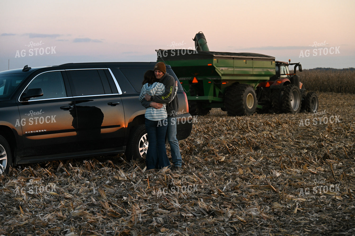 Farmer Hugging Wife in Field 26318