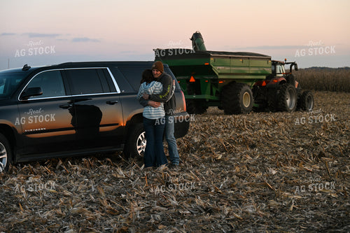 Farmer Hugging Wife in Field 26318