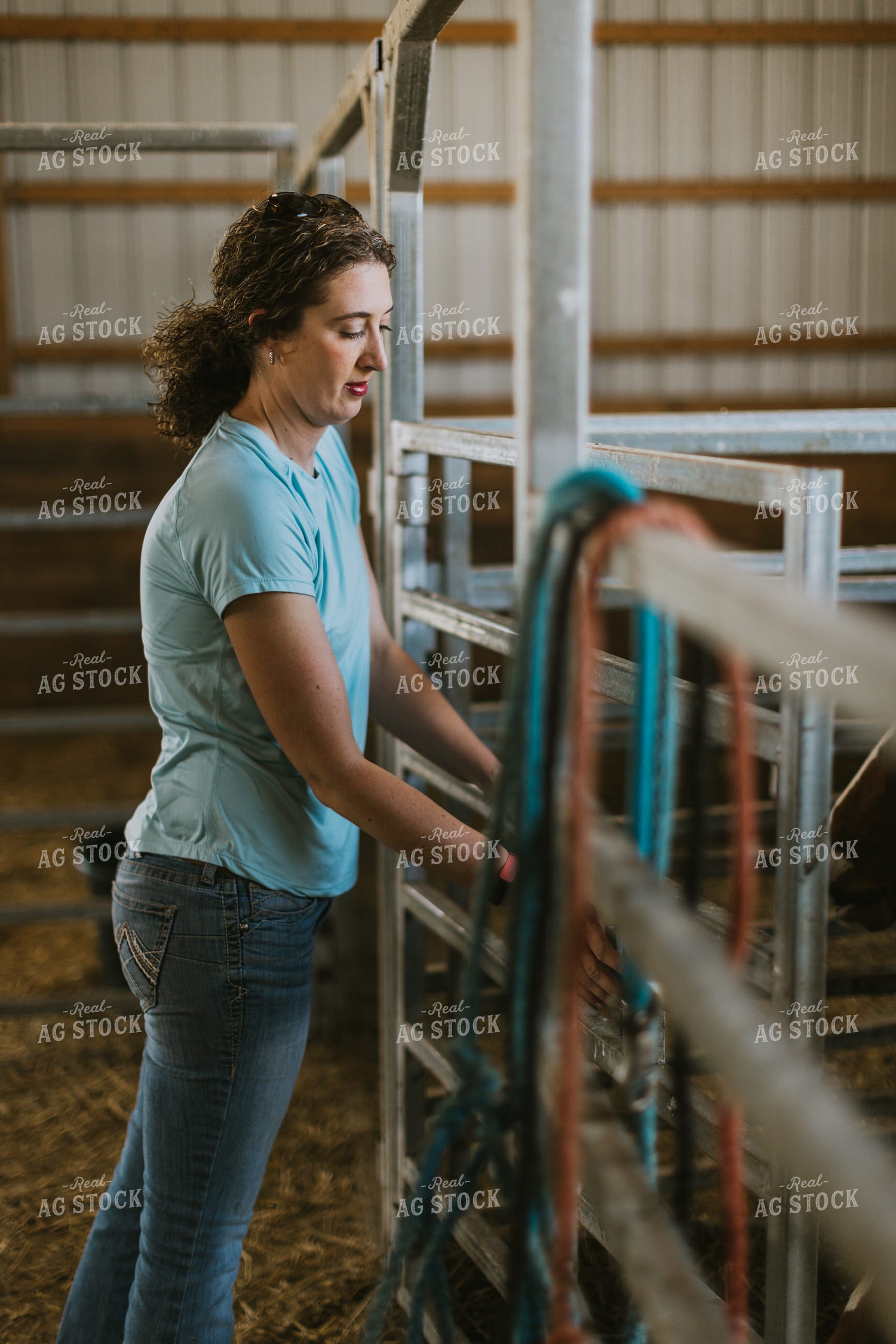 Female Farmer Closes Gate 7863