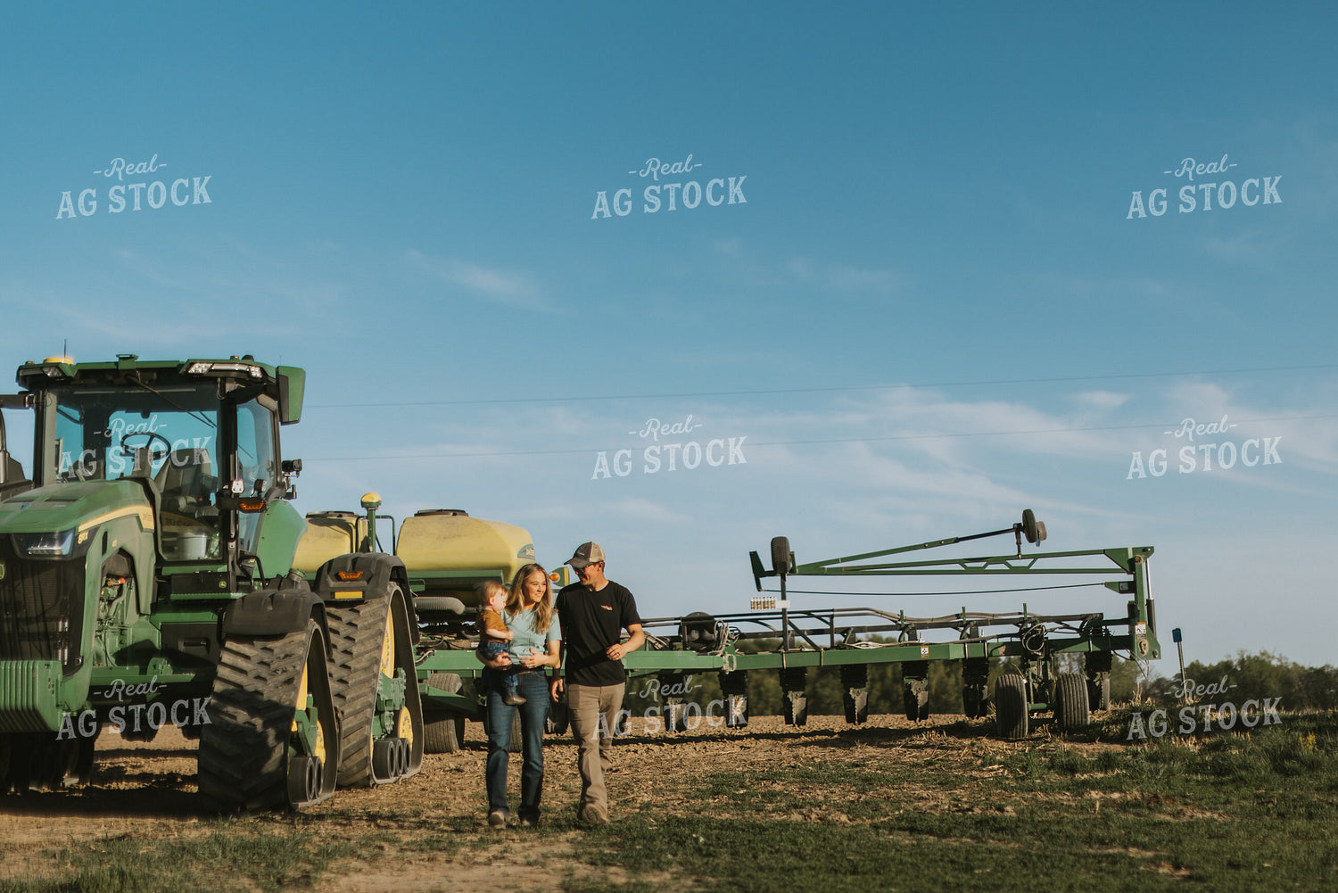Young Couple with Child Walk Away from Tractor 7650