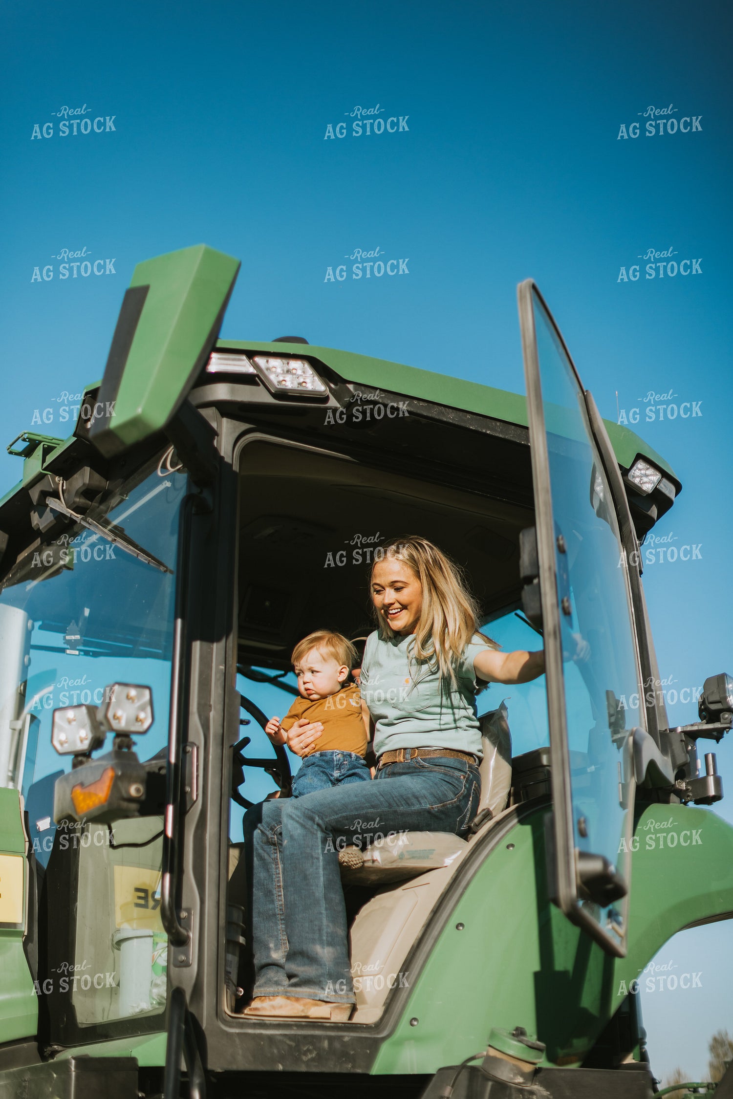 Farm Wife Closes Tractor Door While Holding Child 7648