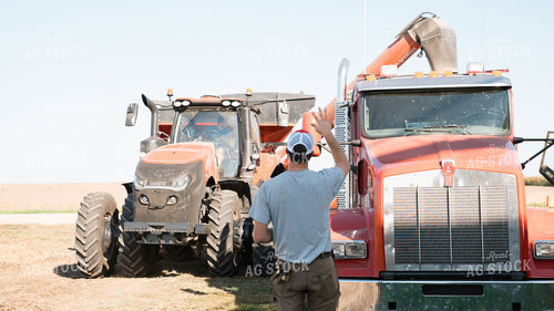 Farmer Guiding Truck Driver 26091