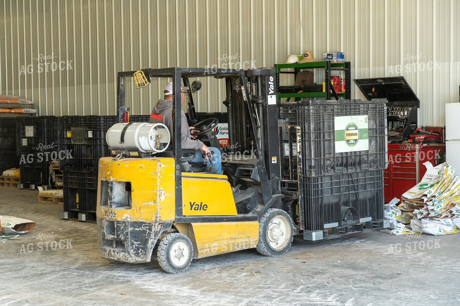 Farmer Driving Skid Steer 65409