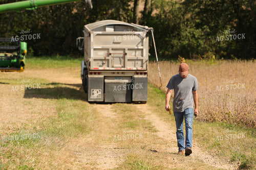 Farmer Walking Down Alley 52533