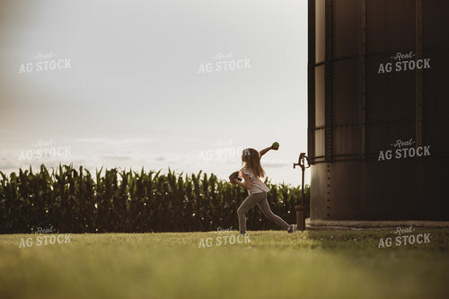 Farm Family Playing Catch Alongside Corn Field 4496